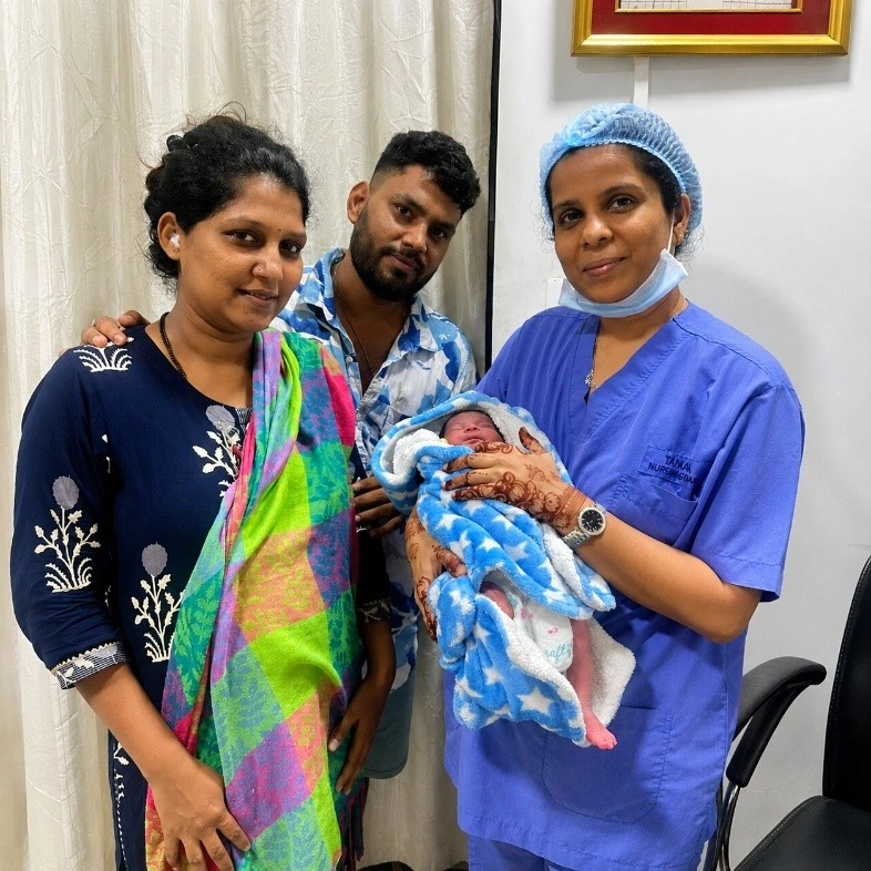 Doctor snehal patil with newborn baby and family